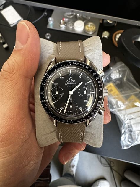 omega speedmaster stopping